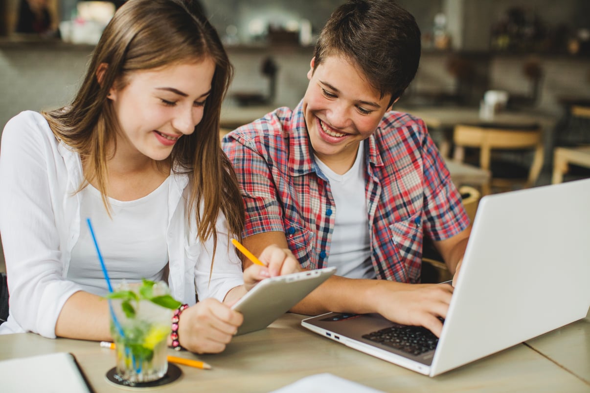 young-girl-boy-with-gadgets
